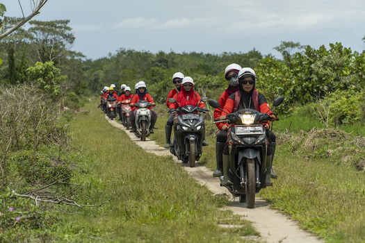 Power of Mama team on motorbikes